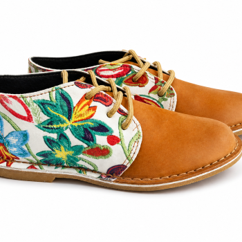 ZANE PRINT floral leather vellies with tan leather front and colourful floral side panels on white background