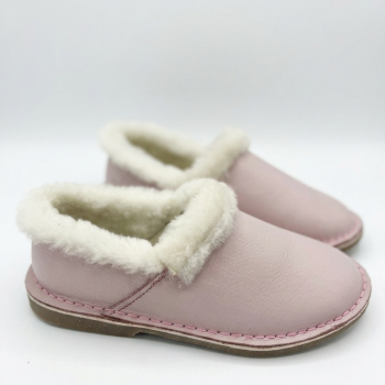 Pink JO slippers with soft fur lining on a white background
